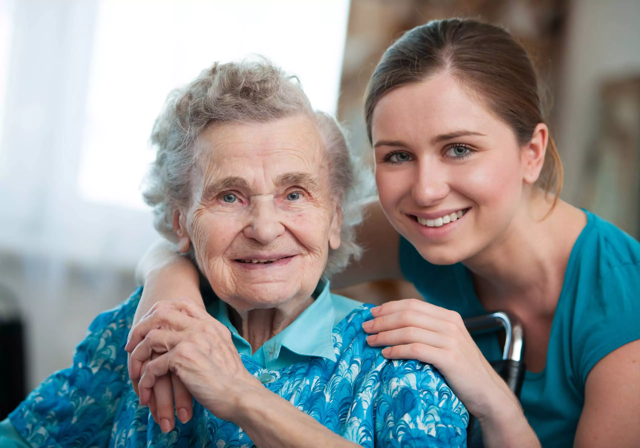 caring healthcare worker with senior